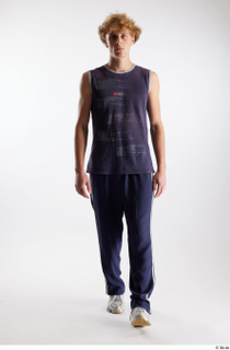 Urien  1 blue tank top blue track pants dressed…